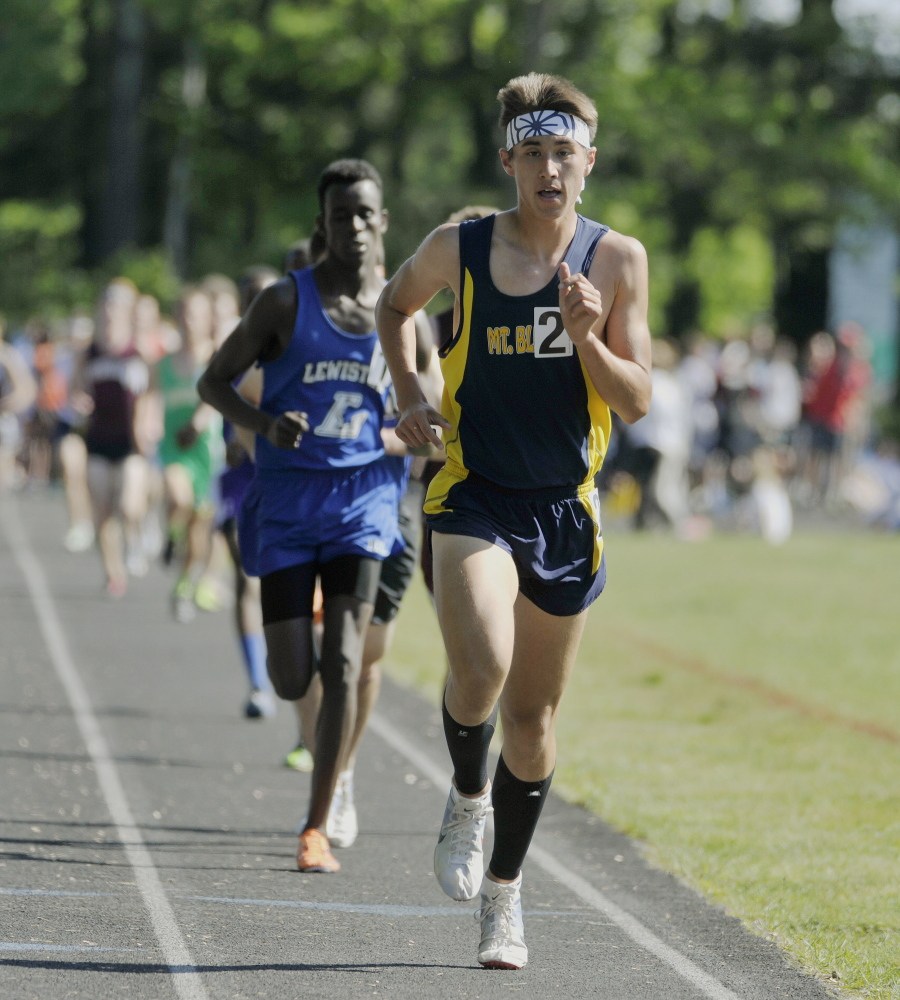 Portland Press Herald photo by John Ewing 
 Mt. Blue senior Aaron Willingham out-paces the field in the 3,200-meter run at the Class A state track and field championships Saturday at Mt. Ararat in Topsham. Willingham won the event in 9 minutes, 39.80 seconds.