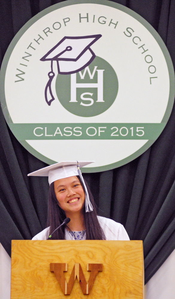 Chen Xi, an exchange student from China, gives a speech during Winthrop High School graduation on Sunday at the school gym in Winthrop.