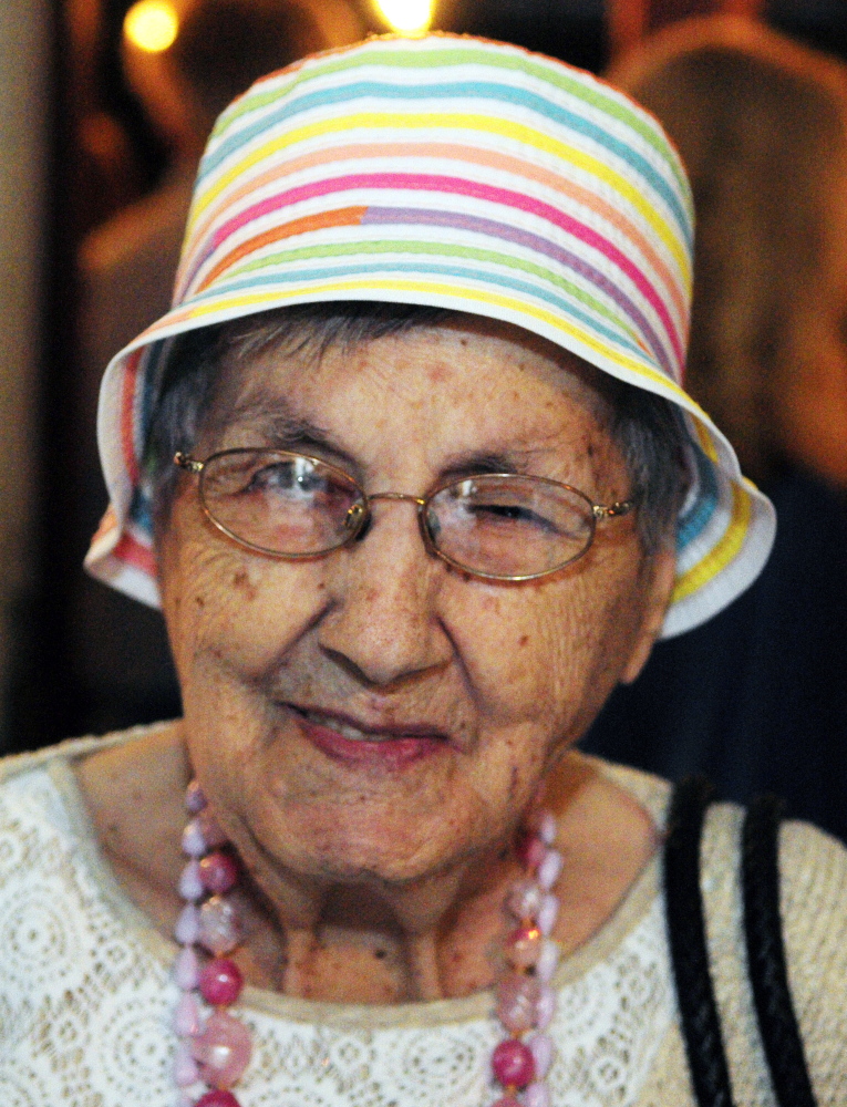 Ruth Barnhart, who was one of the last residents of St. Mark’s Home for Women, attends the opening of “Home/Resilience,” a documentary installation about aging, wisdom and home, which opened Friday at the historic Colonial Theater in downtown Augusta.