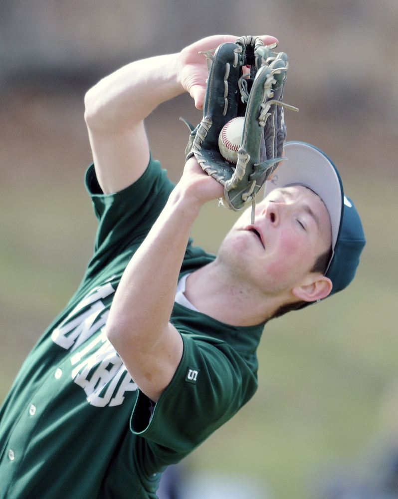 Winthrop High School’s Matt Sekerak grabs a popup at the mound during a Mountain Valley Conference game earlier this season against host Monmouth. Sekerak and the Ramblers will play for the Western C title Wednesday against St. Dominic at St. Joseph’s College in Standish.