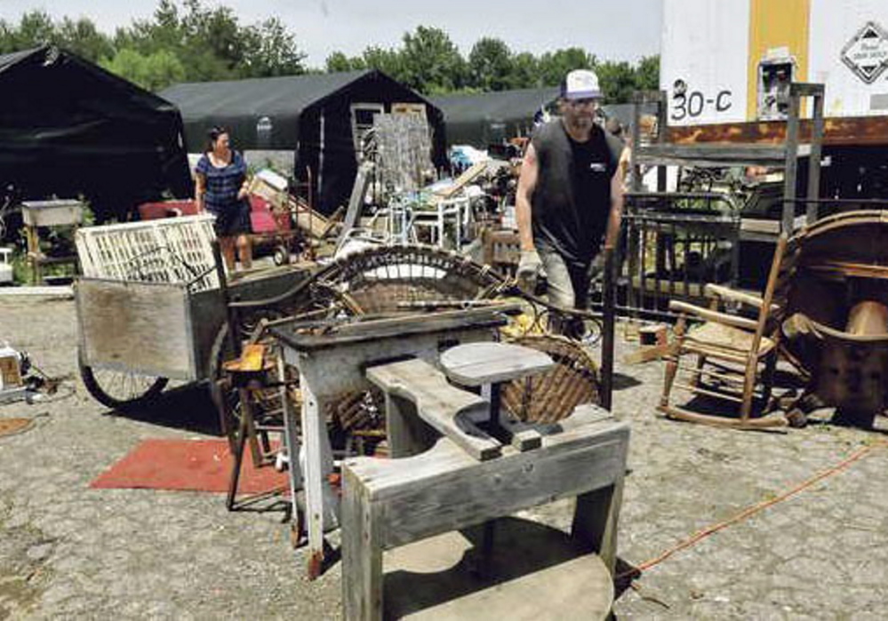 Robert Dale has cleaned up much of the front of his property on U.S. Route 201 in Fairfield since this photo was taken a year ago, in June 2014. The town asked for jail time in Somerset County District Court this week to prod Dale into completing the cleanup of his property.