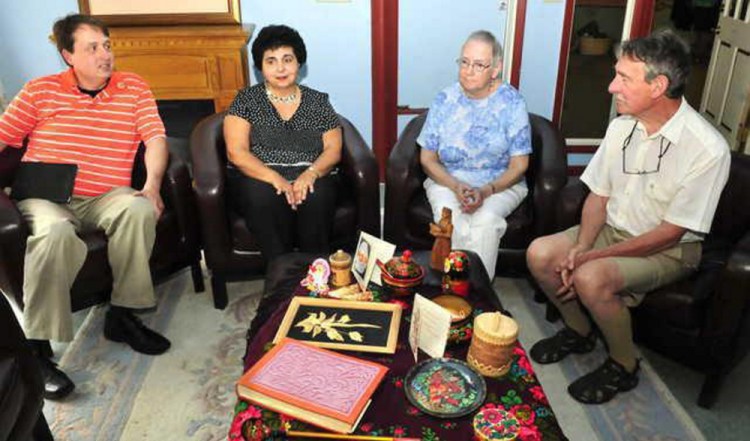 Waterville-Kotlas Sister City Connection members earlier this month discuss the upcoming visit this summer of their Russian counterparts. From left are Mark Fisher, Martha Patterson, Mary Coombs and Peter Garrett. The visitors are expected to arrive on Friday in Waterville.