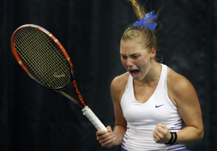 Olivia Leavitt celebrates and with good reason. The Falmouth senior won her third straight singles state championship Monday when she defeated St. Dominic’s Bethany Hammond 6-4, 7-6 (1) at The Racket & Fitness Center.