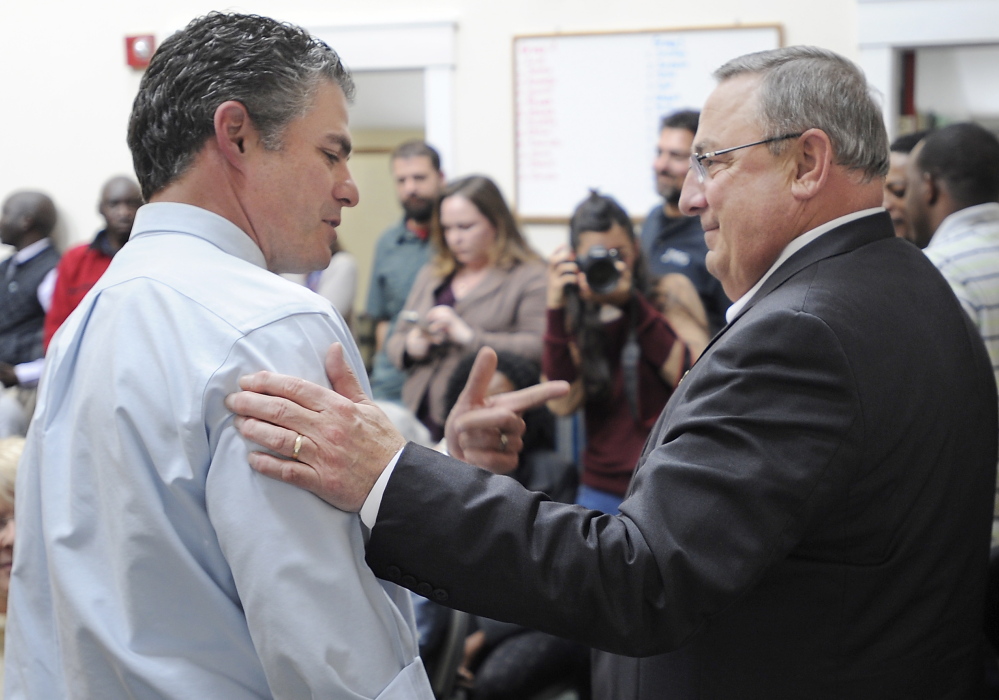 LearningWorks Director Ethan Strimling speaks with Gov. Paul LePage during Wednesday's announcement of a grant for the Building Alternatives program.
Gordon Chibroski/Staff Photographer