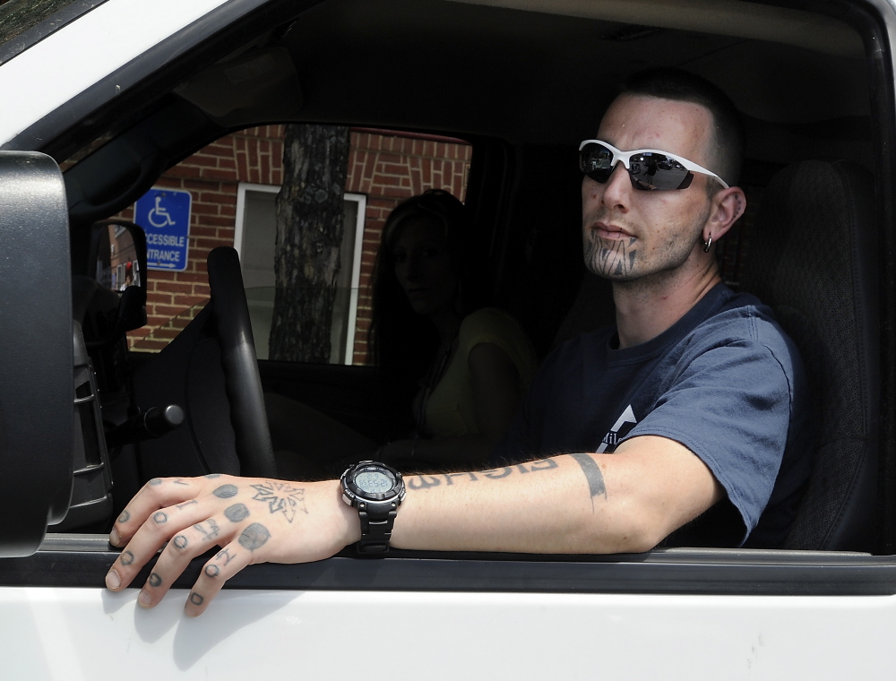 Recovering addict Liam O'Reilly heads out on his job for Milestone to reach out to addicts on the street. 
Gordon Chibroski/Staff Photographer
