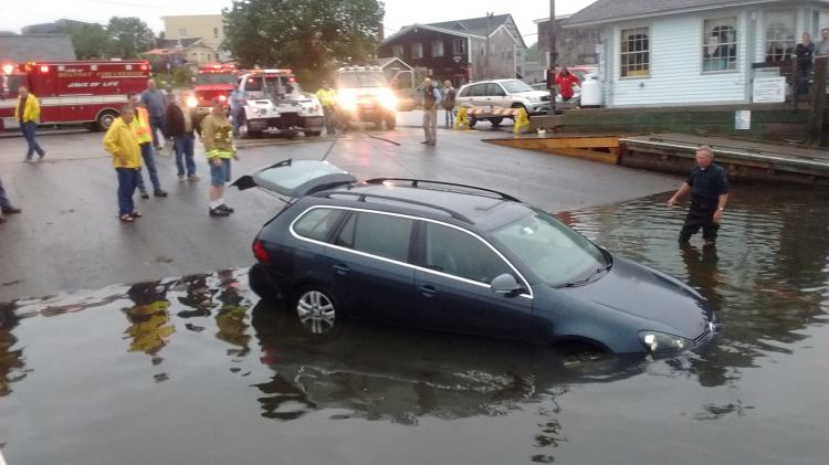 William Haley's 2010 Volkswagon station wagon is pulled out of Belfast Bay after he accidentally drove down a boat ramp and into the water.