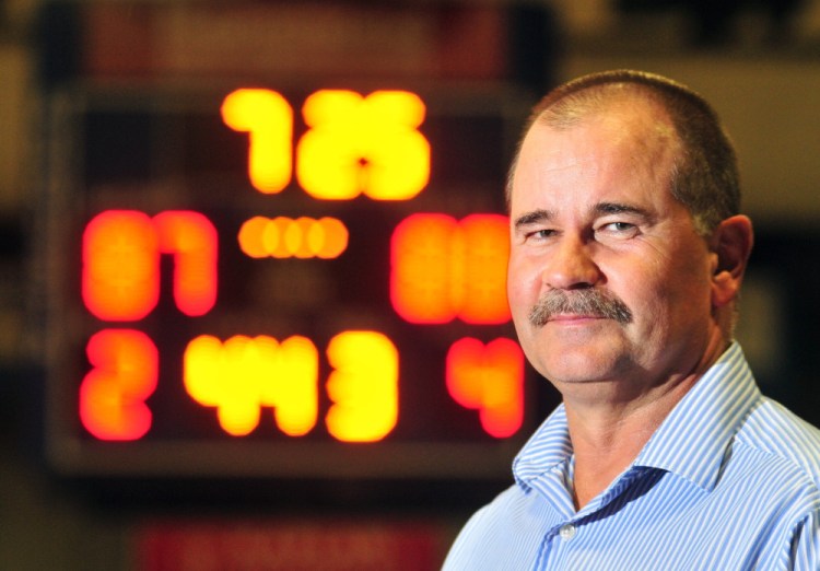 Director Dana Colwill, who retired from the Augusta Civic Center, stands on Wednesday in front of scoreboard that was recently updated with LED lights.