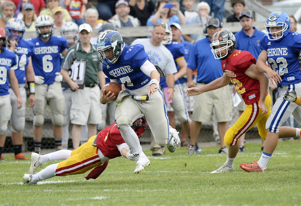 The West's Zach Dubiel of Bonny Eagle eludes a defender during the Lobster Bowl in Biddeford Saturday.