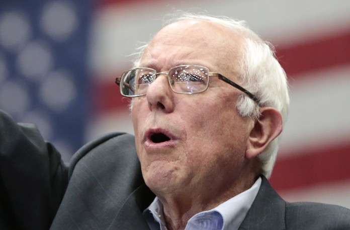 Democratic presidential candidate Sen. Bernie Sanders, I-Vt., arrives at a  rally Wednesday in Madison, Wis.
The Associated Press