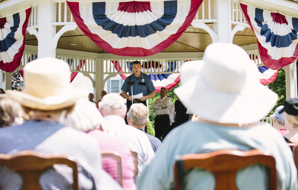 Boothbay Police Chief Robert Hasch speaks to attendees of the vigil for the Jorgensen family in Boothbay on Saturday.