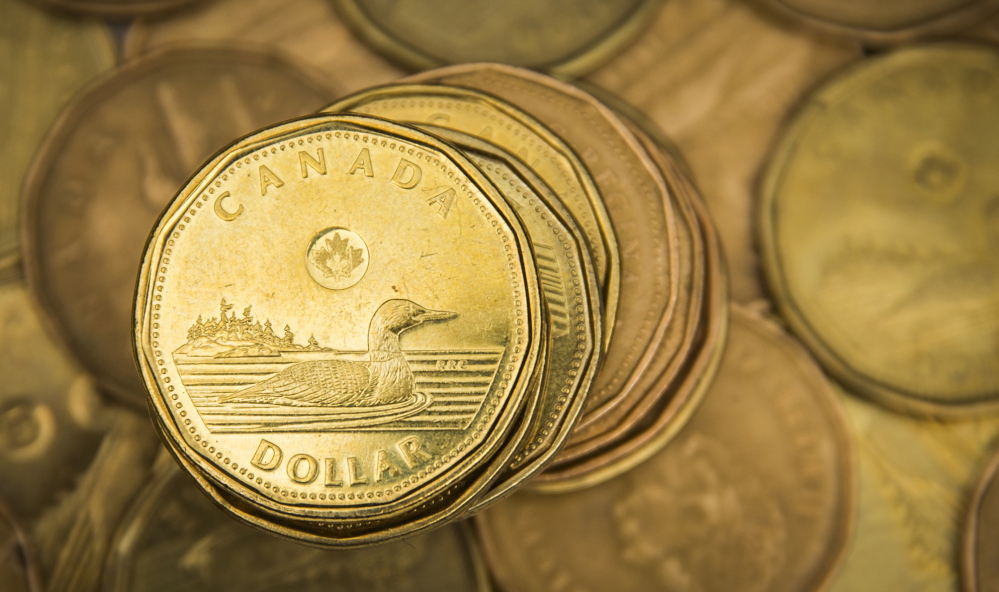 The Canadian dollar coin or “loonie,” once equal to the U.S. dollar, is now worth 78 cents. Many economists believe that Canada is in a recession.