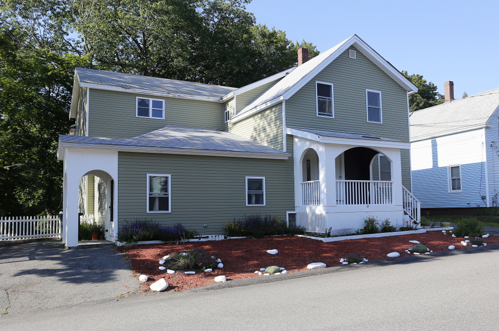 Police say suspect Johnny Ouch of Westbrook was living at 73 East Valentine St., above, where he was arrested Thursday. A woman standing later in the driveway told a reporter that she was not Ouch’s mother. “There is no story here. I don’t want to talk to you,” she said.