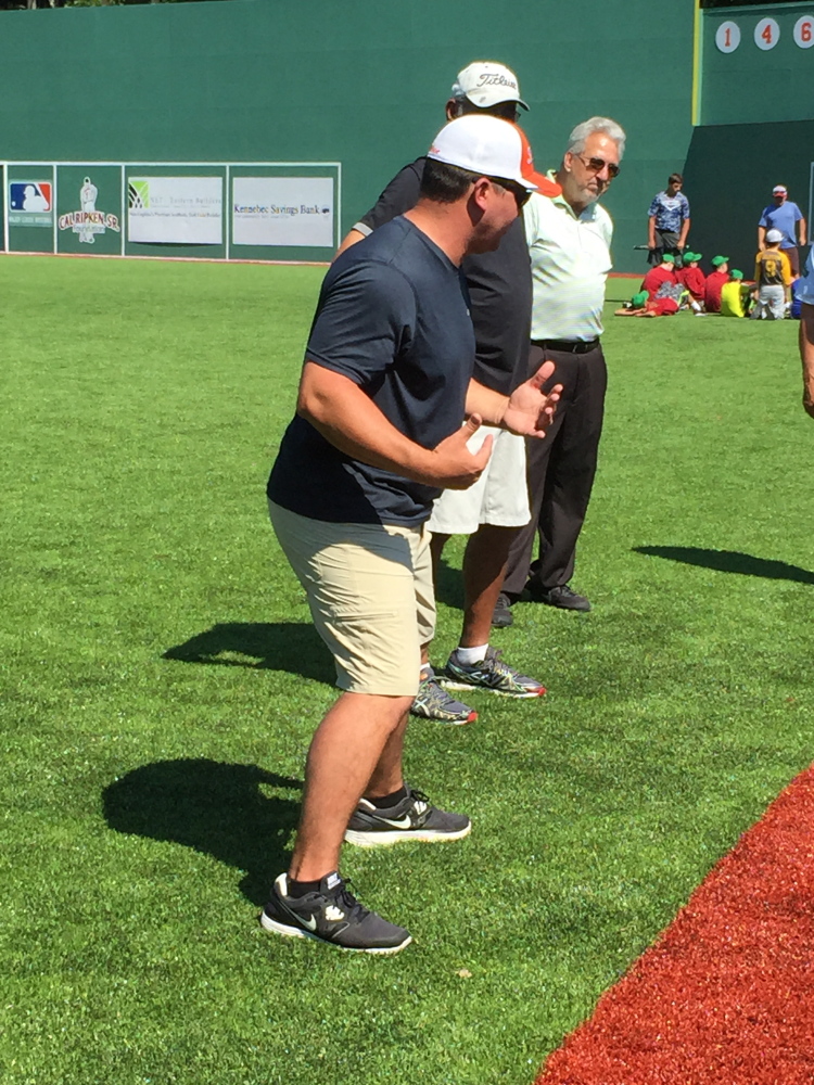 Staff photo by Travis Lazarczyk 
 Former Boston Red Sox closer Keith Foulke talks to players Monday morning at Harold Alfond Fenway Park in Oakland.