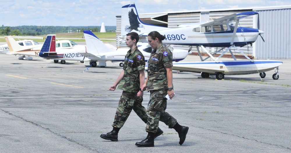 Civil Air Patrol Cadet Airman Damien Jackson, left, practices marching under direction from Cadet 2nd Lt. Veronica Wood on Saturday at the Augusta State Airport.
