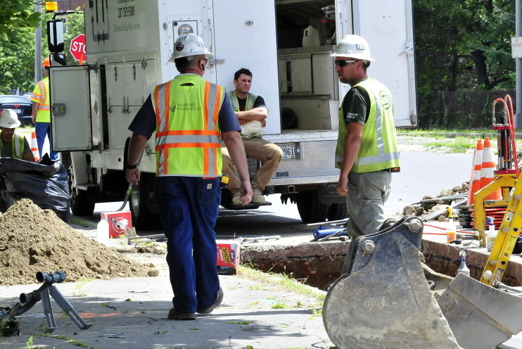 Staff photo by David Leaming
Subcontractors working for Summit Natural Gas company install gas lines on Spring Street in Waterville on Thursday. The company said Thursday it is scaling back its residential build-out because the drop in oil prices has made converstion to natural gas less of a necessary option for people.