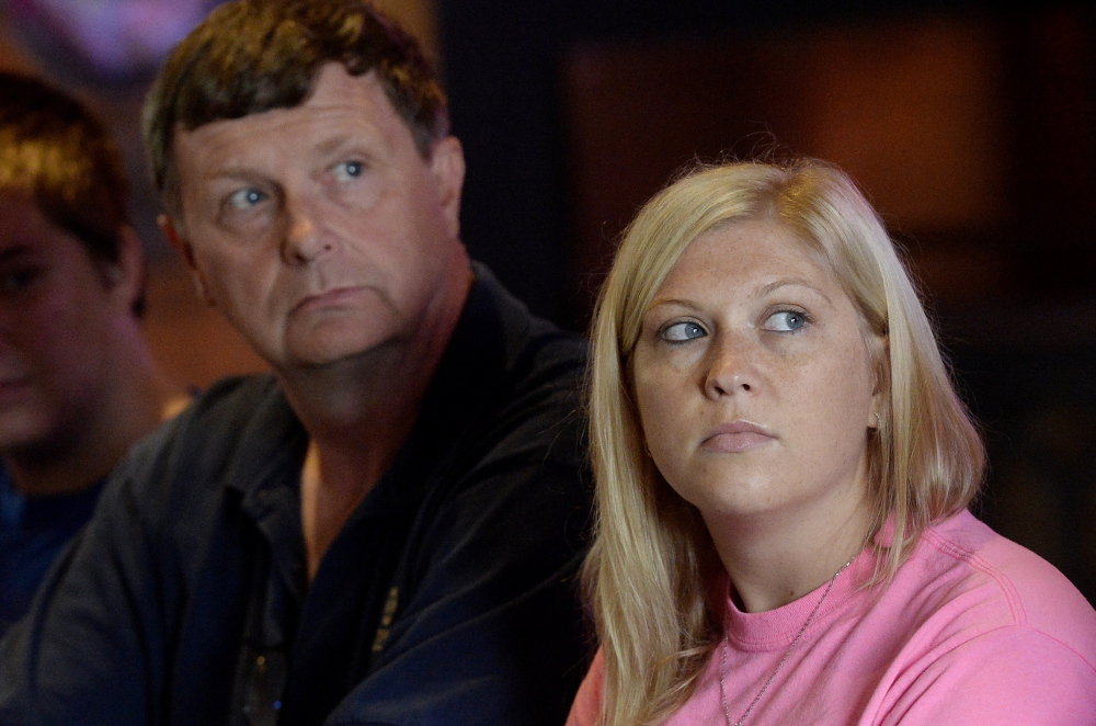 Portland Press Herald photo by Shawn Patrick Ouellette 
 Vanna Brackett, of Buckfield, right, and her father, Tim, listen to questions during Oxford 250 media day in Arundel on July 16, 2014.