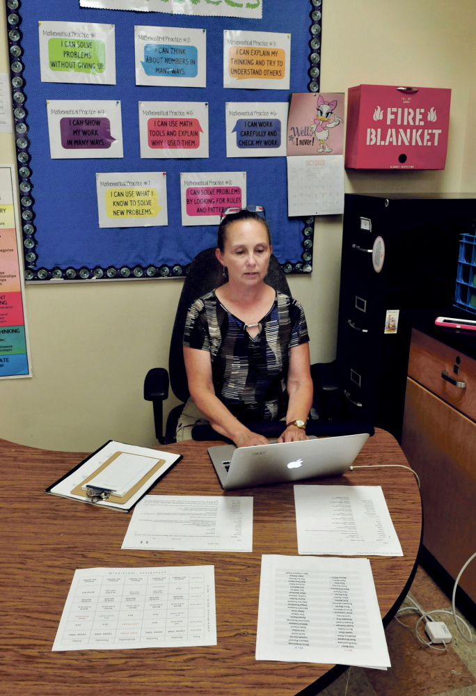 State Teacher of the Year finalist Brenda LaVerdiere prepares her classroom and curriculum at the Academy Hill School in Wilton on Wednesday.