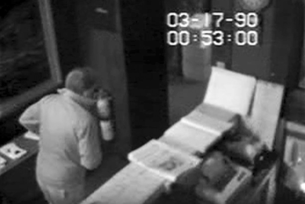In this March 18, 1990, still image from surveillance video released by the U.S. Attorney’s Office,Thursday, Aug. 6, 2015, an unauthorized visitor walks inside the rear entrance of the Isabella Stewart Gardner Museum in Boston. Robbers stole more than a dozen works of art at the museum about 24 hours later. Twenty five years later, the artwork remains missing and no one has ever been charged in the heist. (Isabella Stewart Gardner Museum/U.S. Attorney’s Office via AP)