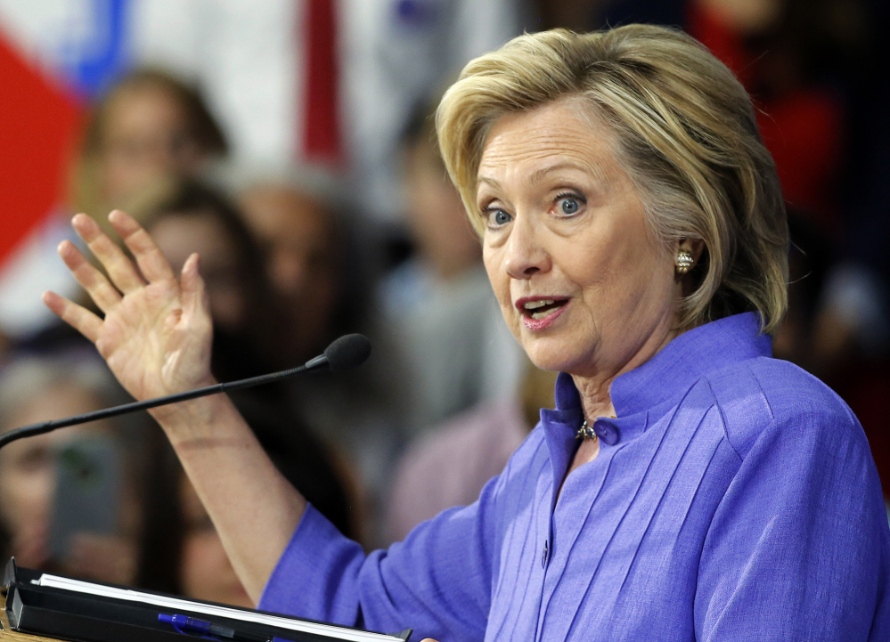 Democratic presidential candidate Hillary Rodham Clinton announces her college affordability plan Monday at the high school in Exeter, N.H. The Associated Press