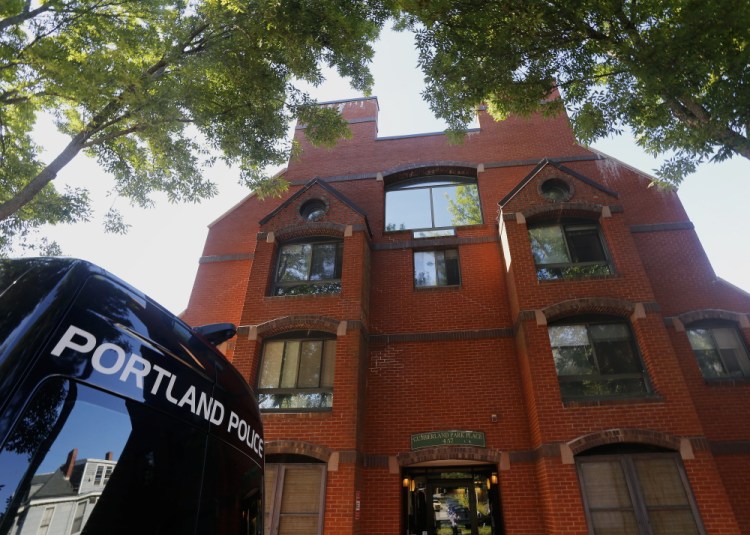 Freddie Akoa, 49, was found dead in his apartment at 457 Cumberland Ave. in Portland, and police have charged three men with murdering him. 