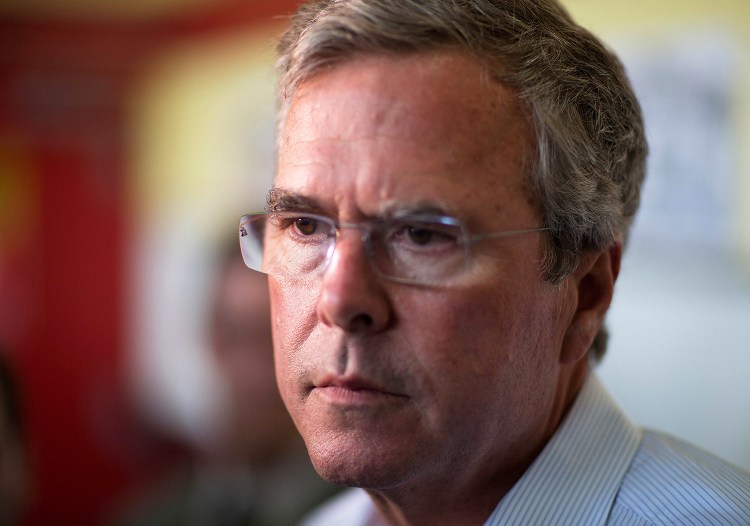 Republican presidential candidate former Florida Gov. Jeb Bush talks to reporters at The Varsity restaurant during a campaign stop in Atlanta. The Associated Press