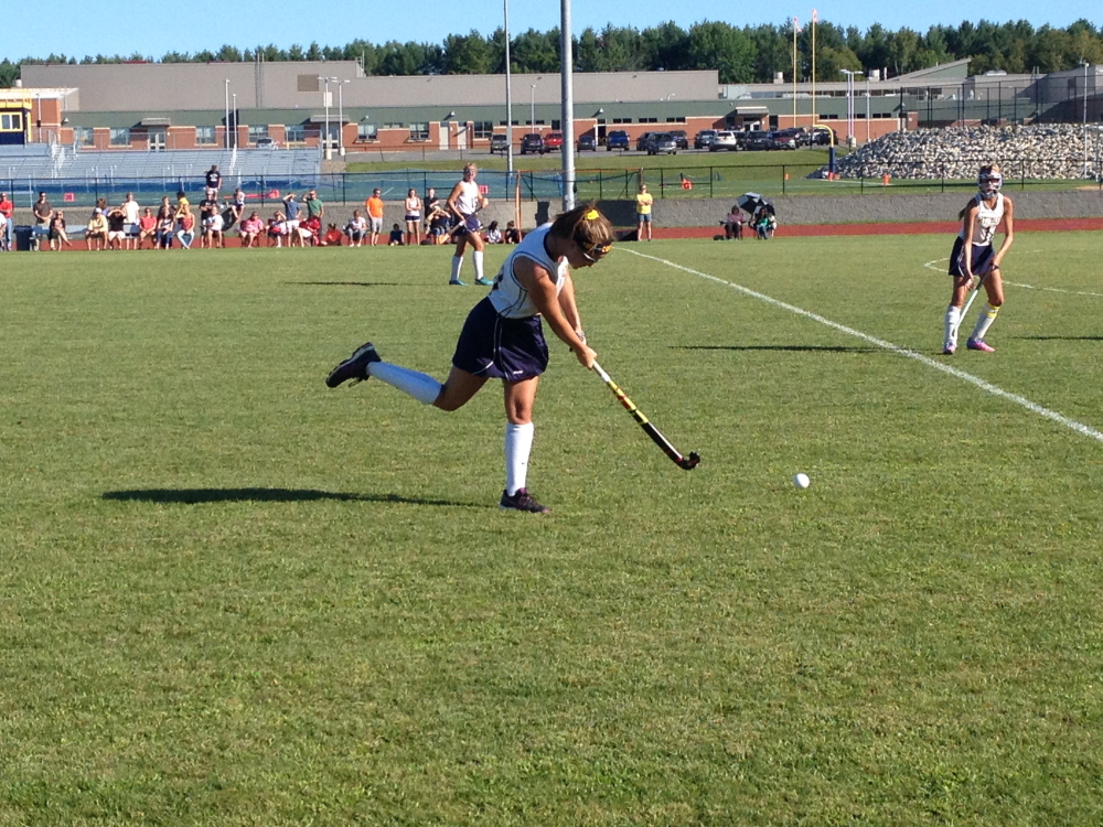 Staff photo by Evan Crawley 
 Mt. Blue's Hannah Minns drives the ball during a Class A North game against Cony in Farmington.