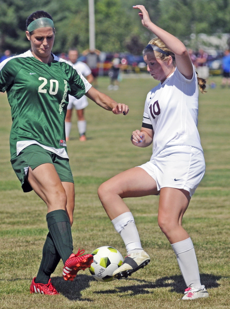 Rangeley’s Blayke Morin, left, and Richmond’s Kelsey Anair battle for a ball during a game Saturday at Richmond High School. Richmond won 5-0.