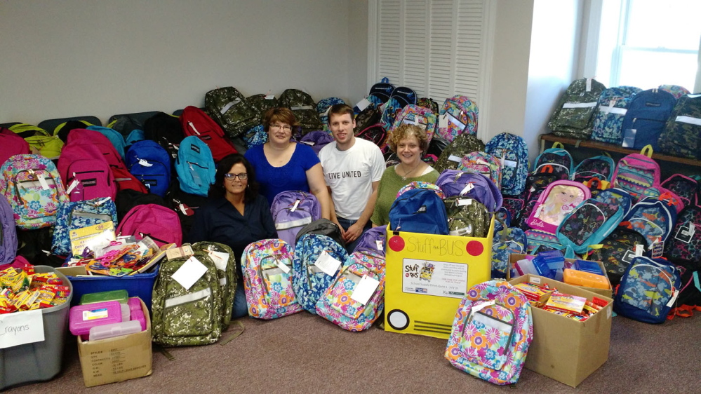 From left, are Lanelle Freeman, KVCAP; Stacy Saucier, UWMM;  John Allen, UWMM; and Elizabeth Barron, executive director, UWMM.