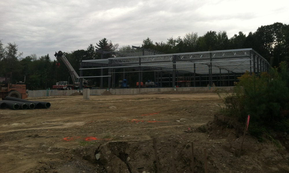 The frame of the 35,000-square-foot F.W. Webb building going up on Kennedy Memorial Drive in Oakland will house distribution and a 4,000-square-foot retail space.