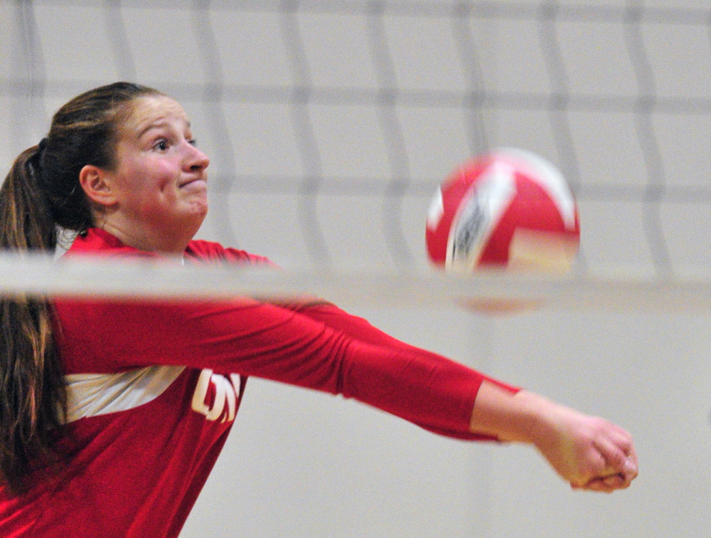 Staff photo by Joe Phelan
Cony’s Catherine Silva returns a shot against Gorham on Thursday at Cony High School in Augusta.