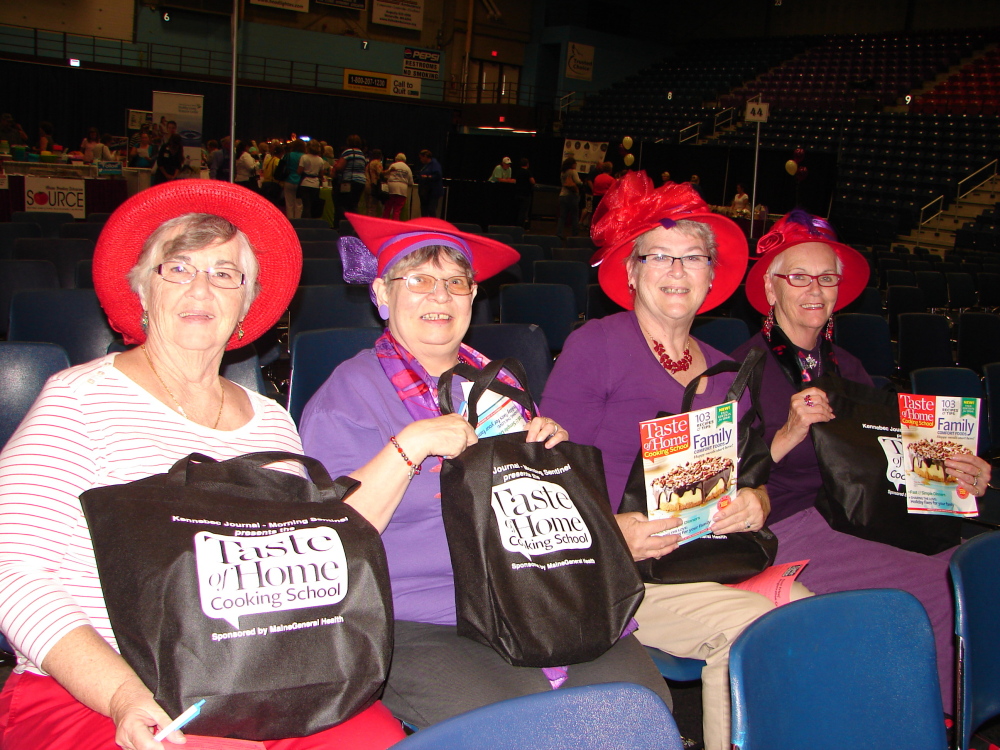 Contribute photo 
 Participants from last year's Taste of Home Cooking School with their gift bags.