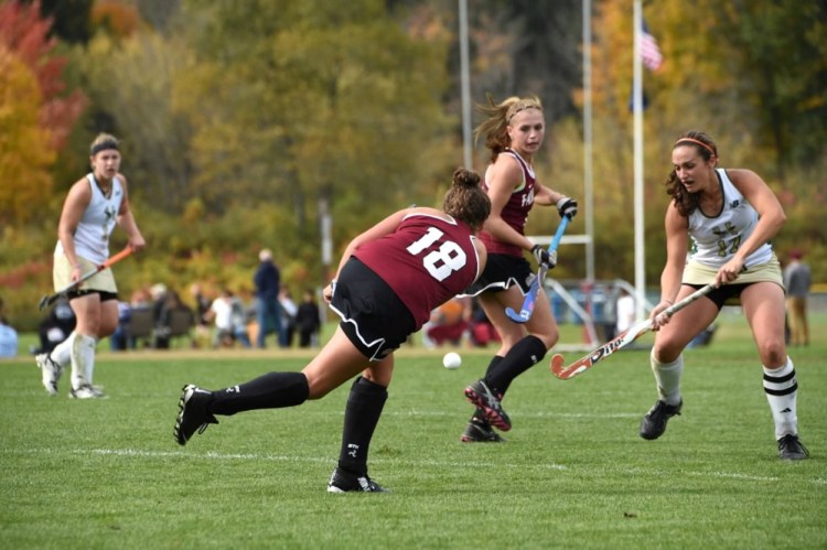 Mara Balboni (18) hits the ball up the field during a game last season against Husson. Balboni, a Messalonskee graduate, has an assist in three games this fall.