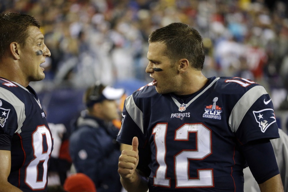 New England Patriots quarterback Tom Brady, right, talks with tight end Rob Gronkowski on the sideline in the first half last week against the Pittsburgh Steelersin Foxborough, Mass. The Patriots play the Buffalo Bills on Sunday.