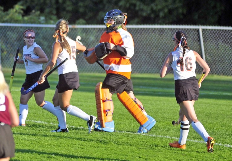 Staff photo by Joe Phelan
The Gardiner field hockey team celebrates after a 4-1 victory over Maine Central Institute on Thursday at Somerville Field in Gardiner.