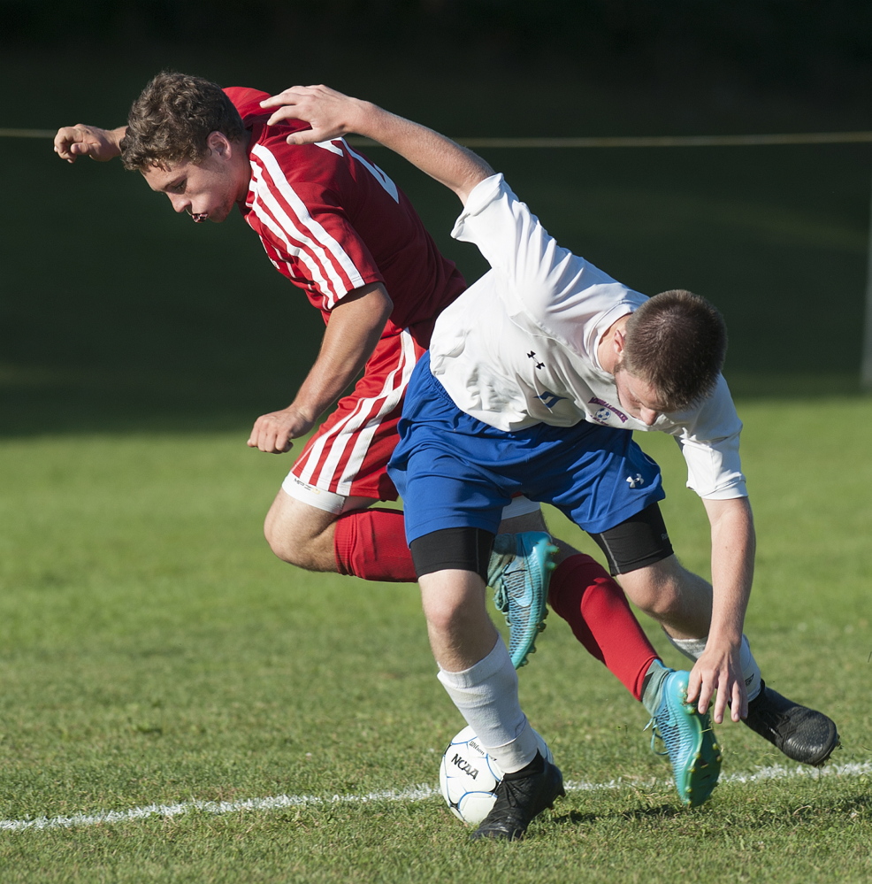 Kevin Bennett photo 
 Cony's Jeff Bilodeau, left, and Messalonskee's Dan Turner collide while attempting to save the ball during a Kennebec Valley Athletic Conference Class A game Friday afternoon.