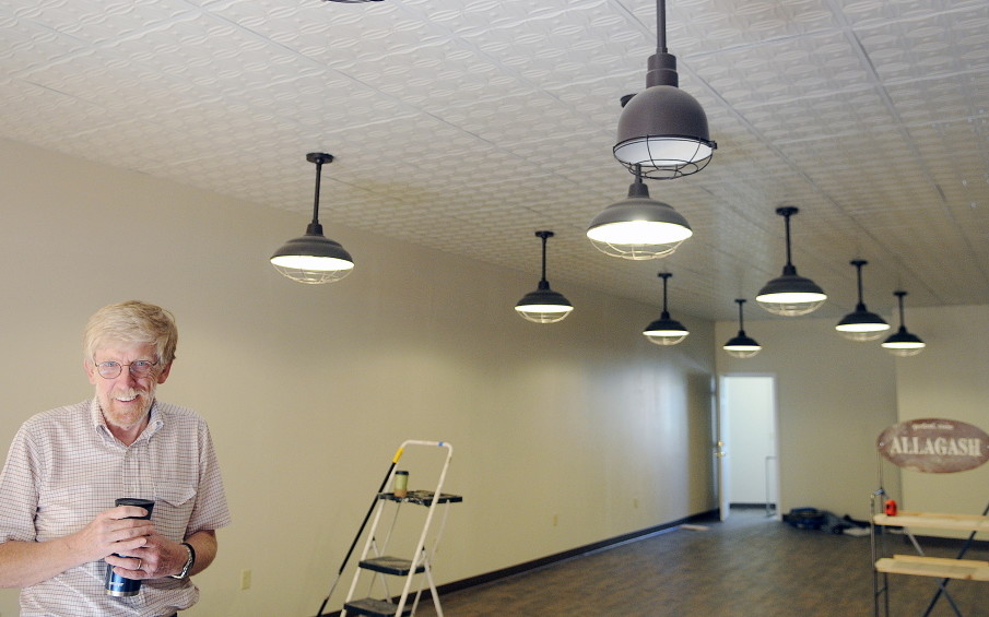 John Callinan at the Water Street building he’s purchased and is renovating to open a Craft Beer Cellar franchise in Gardiner.