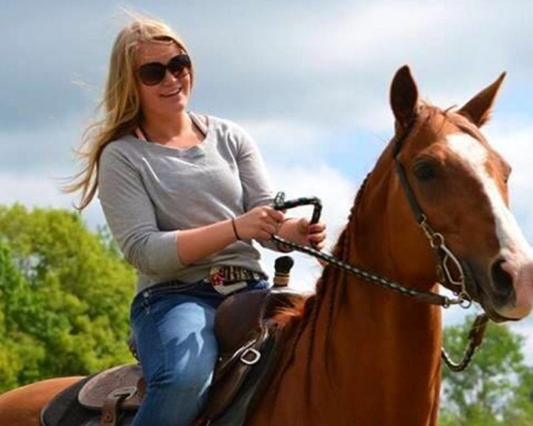 Halee Cummings and one of her horses. The Sidney teen, who died in an ATV accident Friday, loved horses and was a competitive barrel racer.