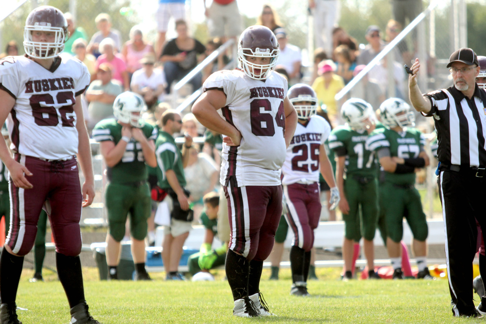 Photo by Jeff Pouland 
 Maine Central Institute's Curtis McLeod lines up on defense in the third quarter of last Saturday's game against Mount View High School in Thorndike. McLeod plays offensive and defensive tackle for the Huskies.