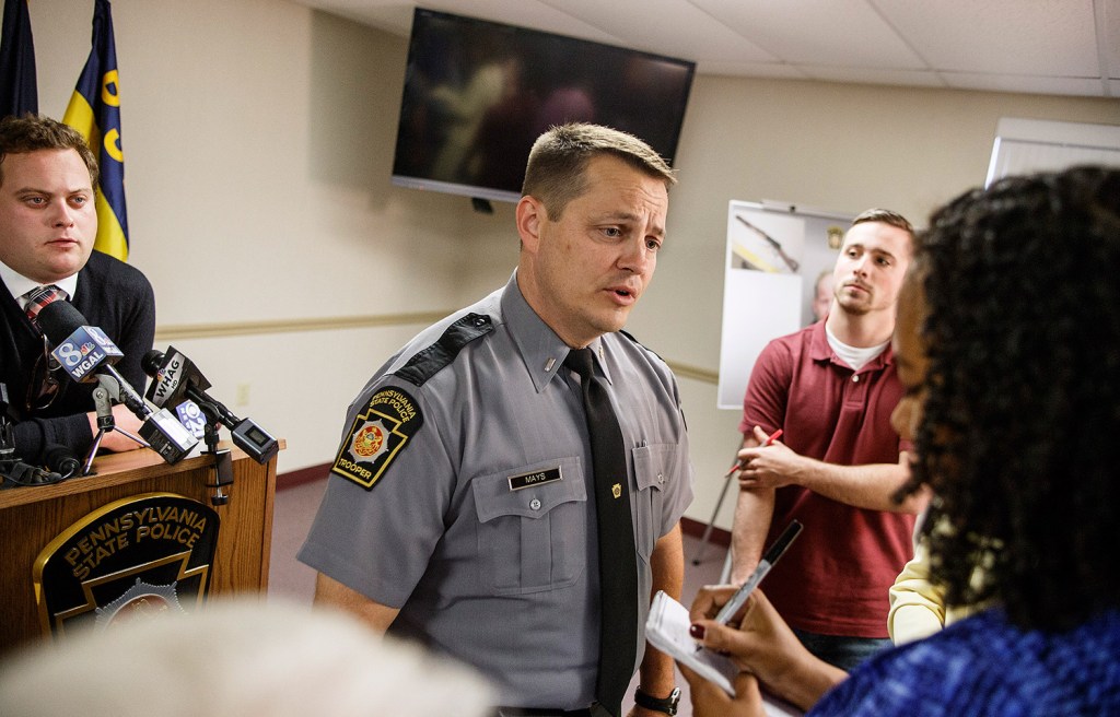 Pennsylvania State Police Cpl. Jonathan Mays speaks to reporters after a press conference Monday, after the arrest of John Wayne Strawser Jr. of West Virginia in the shooting of Timothy "Asti" Davison of Maine.
Dan Gleiter/PennLive.com via AP