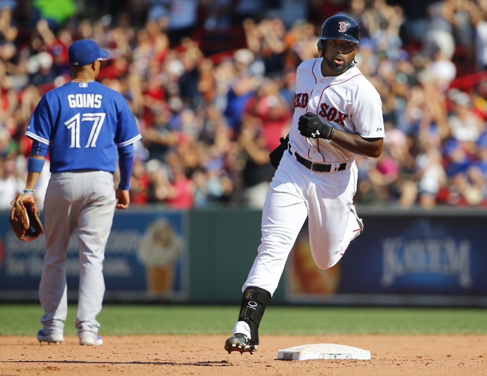 Boston’s Jackie Bradley Jr. rounds the bases after his two-run home run in the sixth inning. Bradley has 24 extra-base hits in his last 25 games.