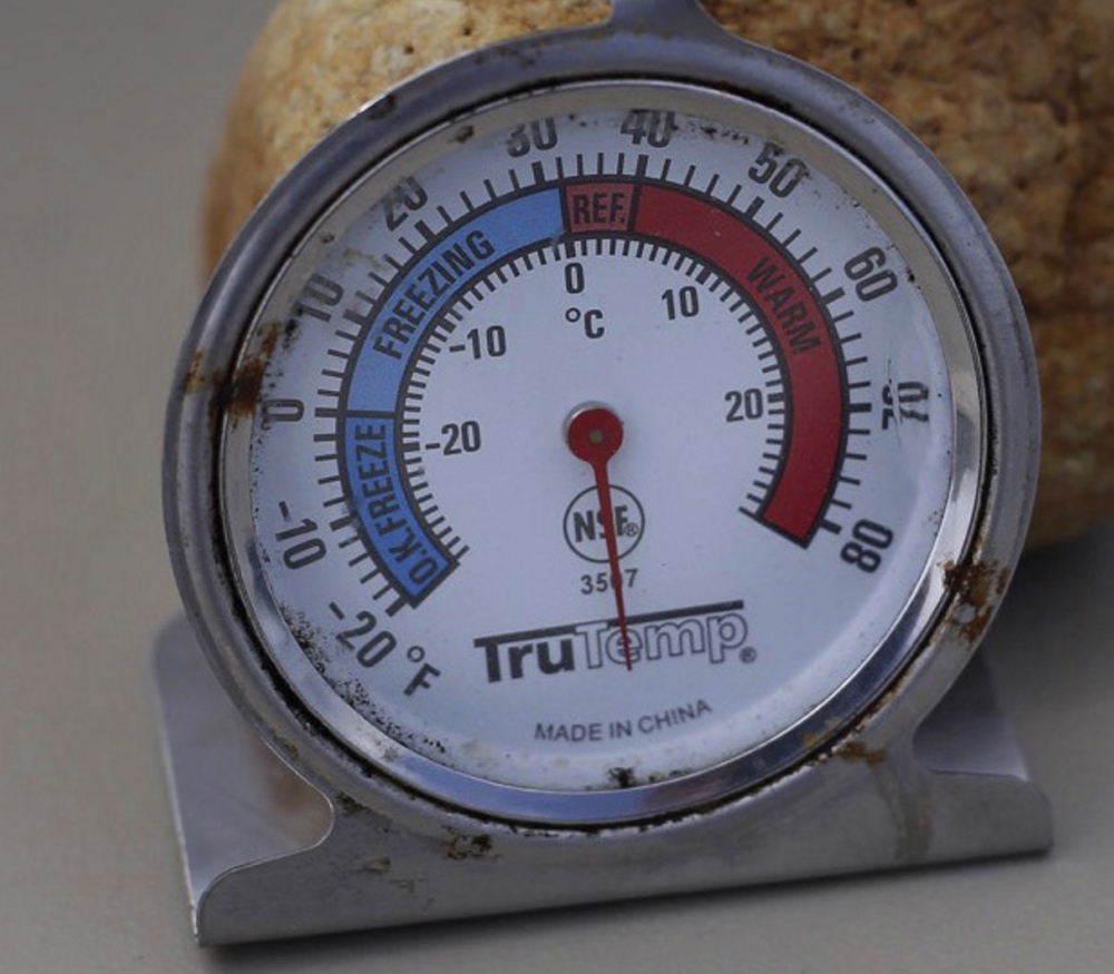 Kevin Fitzpatrick of Scarborough has been camping on the roof of Jimmy the Greek’s at the Maine Mall since Friday, Sept. 4 as a part of a fundraiser for STRIVE, a program designed to address the many issues of young people with developmental disabilities. A thermometer that he borrowed from the walk-in freezer at Jimmy the Greek’s indcates that it is quite hot on the rooftop.