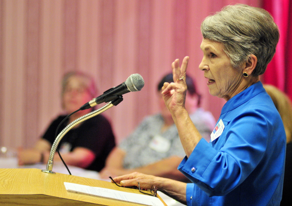 Sandra Wright describes the Mount Vernon Community Partnership’s Neighbors Driving Neighbors Program during the summit on aging Tuesday at the Augusta Civic Center.