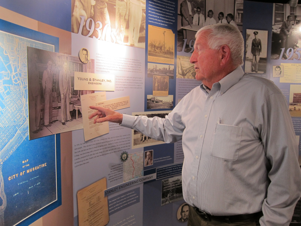 John Sayles, a planner, put off retirement to stay on the job at Stanley Consultants in Muscatine, Iowa. 