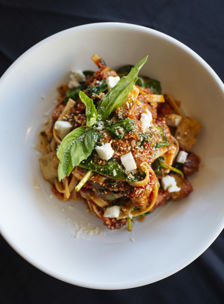 Fettuccine with sausage and crispy eggplant.