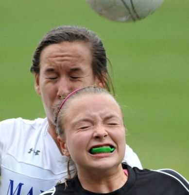 Staff file photo by Michael G. Seamans 
 Madison's Tori McLaughlin battles for possessipon of the ball with Hall-Dale's Eva Shepherd during a Western C quarterfinal game last fall.