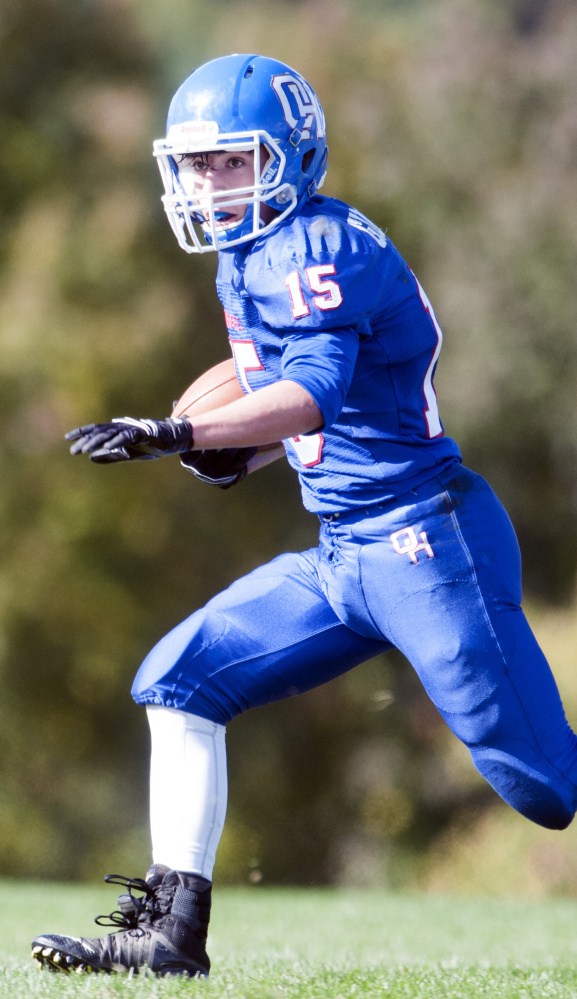 Staff photo by Joe Phelan 
 Oak Hill's Steve Gilbert runs the ball during a Class D South game Saturday against Winthrop/Monmouth in Wales.