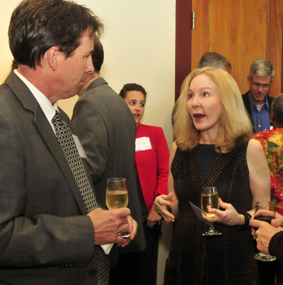 Daniel Shea, director of the Goldfarb Center at Colby College, speaks with journalist Katherine Boo who received the Elijay Lovejoy award on Monday.