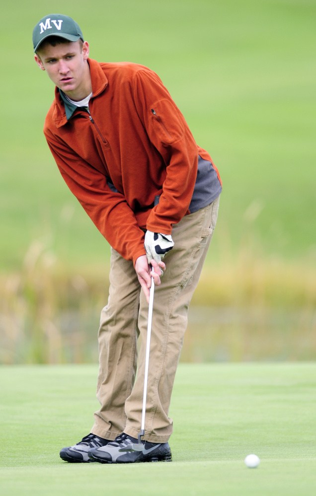 Mount View’s Joey Danna putts on the18th green of Tomahawk during the state team golf tournament Saturday at Natanis Golf Club in Vassalboro.
