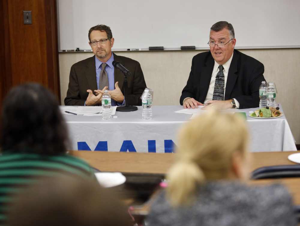Dr. Chris Pezzullo, left, chief health officer, and Kenneth Albert, director and chief operating officer, of the Maine Center for Disease Control and Prevention , discuss the role that immunizations play in disease control and prevention, the public health immunization law and policy, and the tension between such law and personal autonomy.