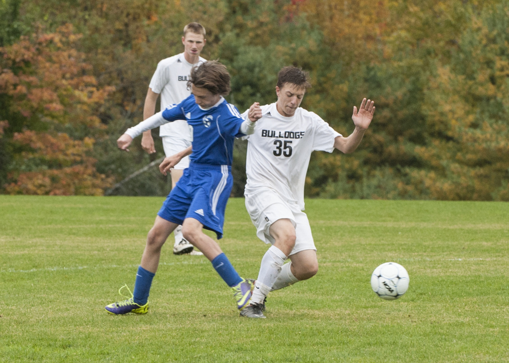 Contributed photo/Marty Thornton
Hall-Dale’s Jett Boyer tries to shake off Mt. Abram’s Tor Tooker during a Mountain Valley Conference game Tuesday in Farmingdale.